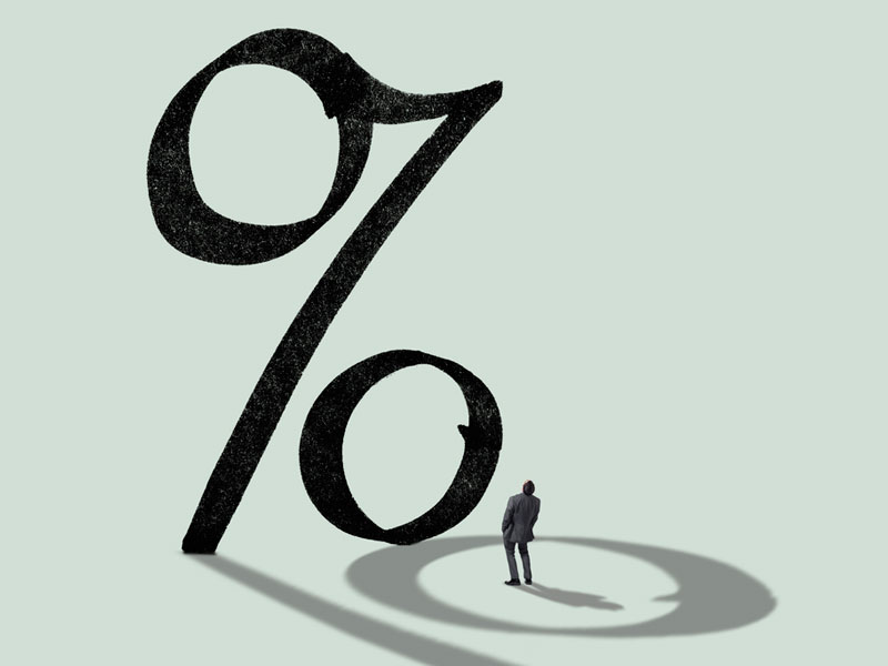 Illustration of a person standing beneath a large percentage sign